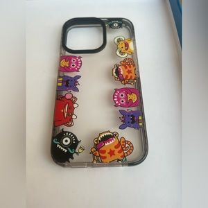 iPhone 13 Pro phone case with cartoon monsters on the sides